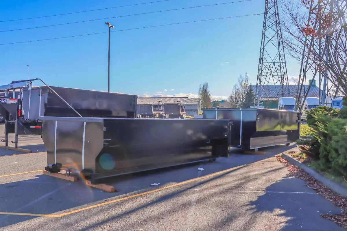 Roll-off dumpster ready for waste disposal at job site for Construction Dumpster Rental in Watertown